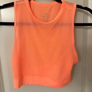 Orange/peach Nike cropped mesh workout top